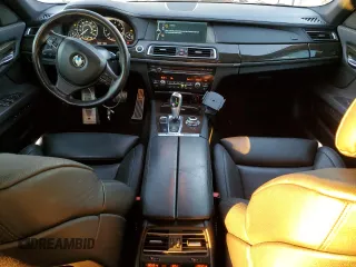2012 BMW 7 Series 740Li with VIN WBAKB4C50CC576043, listed as a Copart auction lot 42060065 with 142,017 mi miles and Salvage Title. Bid and sale history available at carsss.com. Image 8.