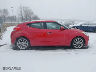 2014 Hyundai Veloster with VIN KMHTC6AD8EU214612, listed as a IAAI auction lot 41258820 with 61,984 mi miles. Bid and sale history available at carsss.com. Image 13.