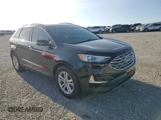 2019 Ford Edge SEL z VIN 2FMPK4J91KBC60322, wystawiony jako Copart lot #53502375 z przebiegiem 103 430 mil mil oraz Szkoda całkowita • Salvage title. Historia ofert i sprzedaży dostępna na DreamBid. Obrazek 14.