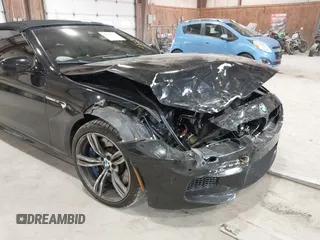 2014 BMW M6 z VIN WBSLZ9C58EDZ78401, wystawiony jako IAAI lot #41840114 z przebiegiem 23 499 mil mil oraz . Historia ofert i sprzedaży dostępna na DreamBid. Obrazek 6.