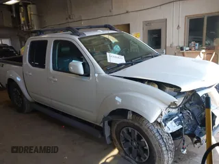 2014 Nissan Frontier SV with VIN 1N6AD0EV4EN736220, listed as a IAAI auction lot 41241823 with 91,789 mi miles and . Bid and sale history available at DreamBid. Image 1.