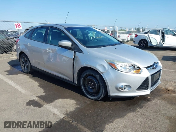 2012 Ford Focus SE z VIN 1FAHP3F28CL215997, wystawiony jako IAAI lot #42483639 z przebiegiem 101 518 mil mil oraz . Historia ofert i sprzedaży dostępna na DreamBid. Obrazek 1.