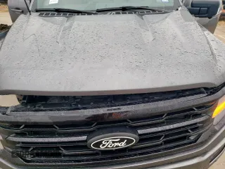 2024 Ford F-150 XLT with VIN 1FTFW3L55RFA14004, listed as a Copart auction lot 45779285 with 14,944 mi miles and Salvage Title. Bid and sale history available at carsss.com. Image 12.