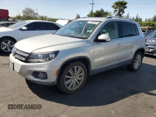2012 Volkswagen Tiguan SEL with VIN WVGAV7AXXCW521394, listed as a Copart auction lot 53000555 with 126,017 mi miles and Salvage Title. Bid and sale history available at DreamBid. Image 1.