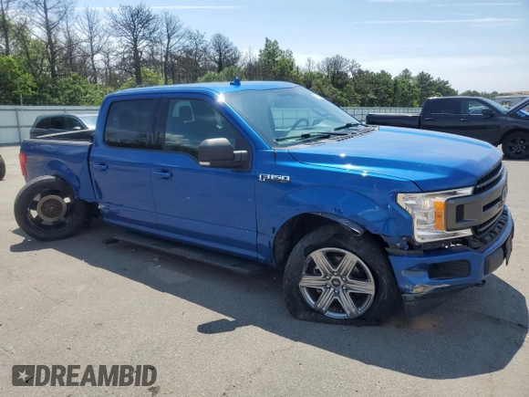 2018 Ford F-150 XL with VIN 1FTEW1E57JKF38196, listed as a Copart auction lot 62701035 with 97,366 mi miles and Salvage title. Bid and sale history available at DreamBid. Image 4.