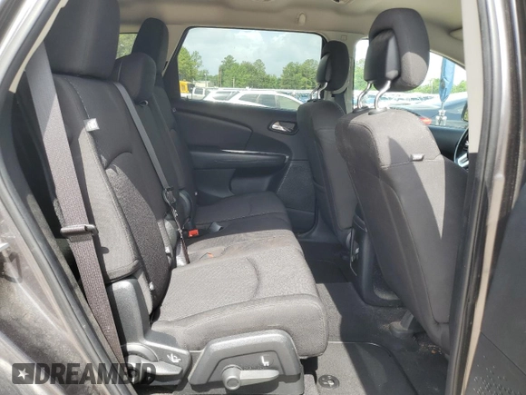2017 Dodge Journey SXT with VIN 3C4PDDBG9HT639285, listed as a Copart auction lot 58600005 with 124,887 mi miles and Salvage title. Bid and sale history available at DreamBid. Image 10.