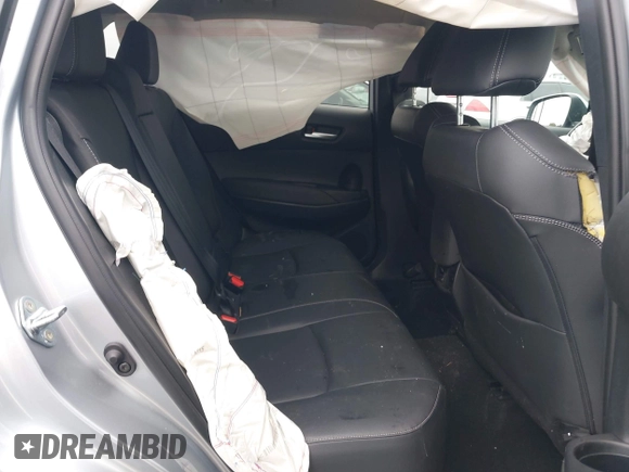 2023 Toyota Corolla Cross XLE with VIN 7MUEAABG8PV077117, listed as a IAAI auction lot 42052305 with 21,571 mi miles and . Bid and sale history available at DreamBid. Image 8.