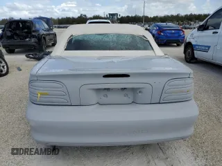 1995 Ford Mustang with VIN 1FALP4444SF177184, listed as a Copart auction lot 78695874 with 119,729 mi miles and Salvage title. Bid and sale history available at DreamBid. Image 6.