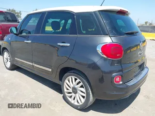 2014 FIAT 500L Lounge z VIN ZFBCFACH9EZ005710, wystawiony jako IAAI lot #42508508 z przebiegiem 96 652 mil mil oraz . Historia ofert i sprzedaży dostępna na DreamBid. Obrazek 3.