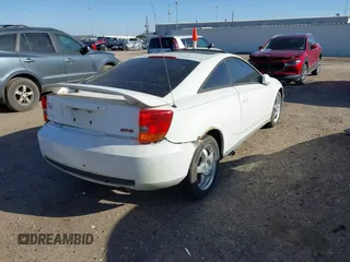 2000 Toyota Celica GTS with VIN JTDDY32T7Y0023984, listed as a IAAI auction lot 41715373 with 234,385 mi miles. Bid and sale history available at carsss.com. Image 4.