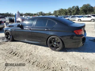 2016 BMW M5 with VIN WBSFV9C57GD595447, listed as a Copart auction lot 41343845 with 50,029 mi miles and Salvage Title. Bid and sale history available at carsss.com. Image 2.