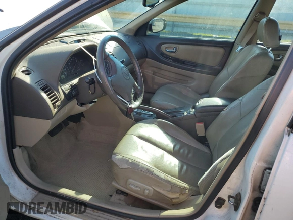 2001 Nissan Maxima SE 20th Anniversary. z VIN JN1CA31A81T313061, wystawiony jako Copart lot #72608504 z przebiegiem 200 484 mil mil oraz Szkoda całkowita • Salvage title. Historia ofert i sprzedaży dostępna na DreamBid. Obrazek 7.