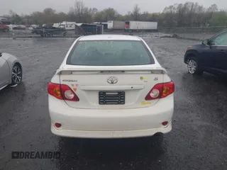 2010 Toyota Corolla with VIN 2T1BU4EEXAC413978, listed as a IAAI auction lot 41953898 with 121,676 mi miles. Bid and sale history available at carsss.com. Image 17.