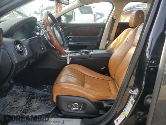 2016 Jaguar XJ R-Sport с VIN SAJWJ1CDXG8W03448, выставлен на аукционе Copart как лот 48188865 с пробегом 65 356 миль миль и Списание • Salvage title. История ставок и продаж доступна на DreamBid. Изображение 7.