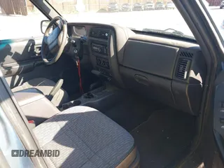 1999 Jeep Cherokee Sport with VIN 1J4FF68S7XL541101, listed as a IAAI auction lot 42518775 with 213,762 mi miles and . Bid and sale history available at DreamBid. Image 5.