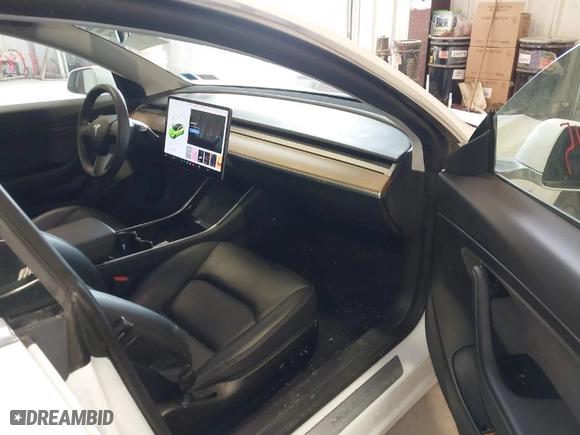 2020 Tesla Model 3 Standard Range Plus with VIN 5YJ3E1EA4LF802207, listed as a IAAI auction lot 41843515 with 67,156 mi miles. Bid and sale history available at carsss.com. Image 5.