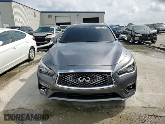 2023 Infiniti Q50 Luxe z VIN JN1EV7BR2PM541987, wystawiony jako Copart lot #53506195 z przebiegiem 65 202 mil mil oraz Szkoda całkowita • Salvage title. Historia ofert i sprzedaży dostępna na DreamBid. Obrazek 13.