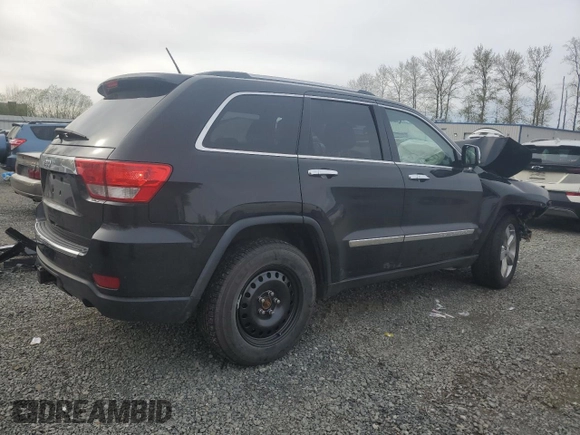 2013 Jeep Grand Cherokee Overland with VIN 1C4RJFCGXDC643802, listed as a Copart auction lot 52429535 with 122,014 mi miles and Salvage Title. Bid and sale history available at carsss.com. Image 3.