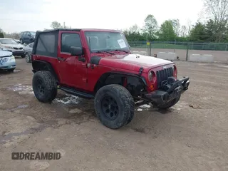 2013 Jeep Wrangler Sport with VIN 1C4AJWAG9DL609432, listed as a IAAI auction lot 42124054 with 129,784 mi miles and . Bid and sale history available at DreamBid. Image 1.