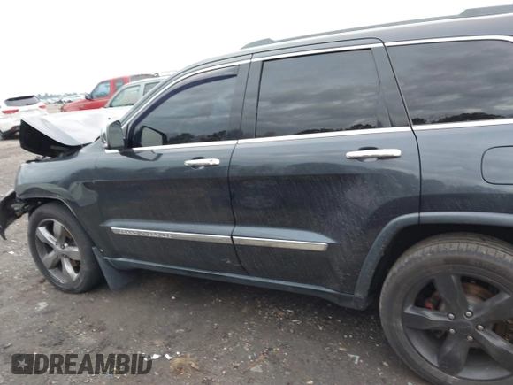 2012 Jeep Grand Cherokee Overland with VIN 1C4RJECT7CC334116, listed as a IAAI auction lot 40968071 with 98,794 mi miles. Bid and sale history available at carsss.com. Image 14.