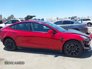 2023 Tesla Model 3 z VIN 5YJ3E1EA4PF454981, wystawiony jako IAAI lot #42704135 z przebiegiem 93 008 mil mil oraz . Historia ofert i sprzedaży dostępna na DreamBid. Obrazek 14.