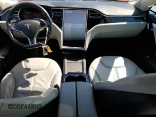 2014 Tesla Model S 60 with VIN 5YJSA1S12EFP65799, listed as a Copart auction lot 50895235 with 132,669 mi miles and Salvage Title. Bid and sale history available at DreamBid. Image 8.