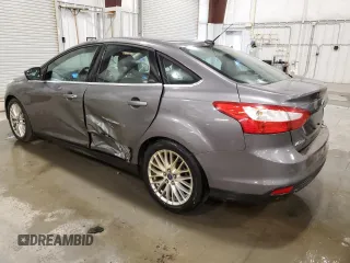 2012 Ford Focus SEL with VIN 1FAHP3H29CL386660, listed as a Copart auction lot 51447905 with 210,075 mi miles and Salvage Title. Bid and sale history available at carsss.com. Image 2.