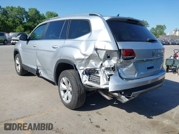 2019 Volkswagen Atlas SE with VIN 1V2UR2CA2KC557449, listed as a IAAI auction lot 42281302 with 106,739 mi miles and . Bid and sale history available at DreamBid. Image 3.