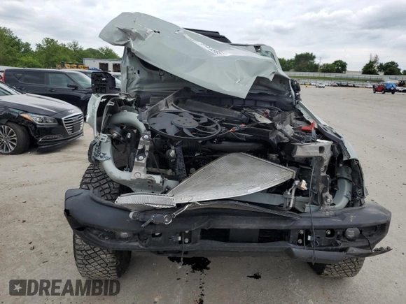 2023 Ford Bronco z VIN 1FMEE5DP1PLB38727, wystawiony jako Copart lot #62945695 z przebiegiem 25 342 mil mil oraz Szkoda całkowita • Salvage title. Historia ofert i sprzedaży dostępna na DreamBid. Obrazek 5.