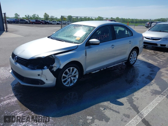 2011 Volkswagen Jetta SE with VIN 3VWDZ7AJ6BM346719, listed as a IAAI auction lot 42287049 with 179,837 mi miles and . Bid and sale history available at DreamBid. Image 2.