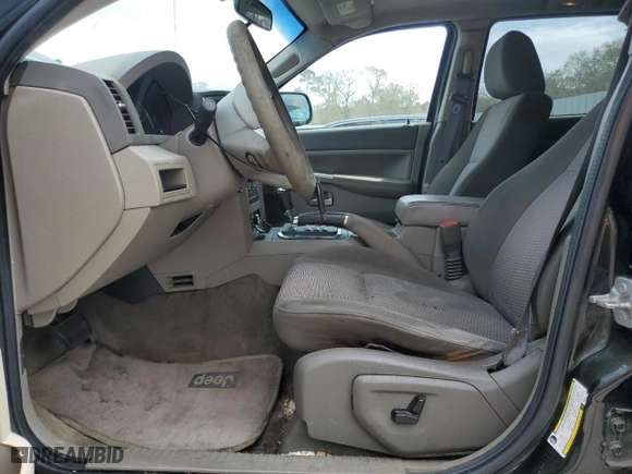 2009 Jeep Grand Cherokee Laredo with VIN 1J8GS48KX9C527120, listed as a Copart auction lot 50531925 with 165,085 mi miles and Clean Title. Bid and sale history available at carsss.com. Image 7.