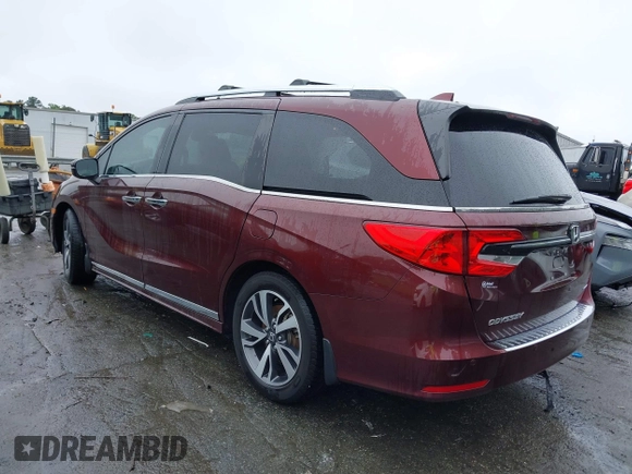 2021 Honda Odyssey Touring with VIN 5FNRL6H88MB006938, listed as a IAAI auction lot 42367022 with 63,280 mi miles and . Bid and sale history available at DreamBid. Image 3.