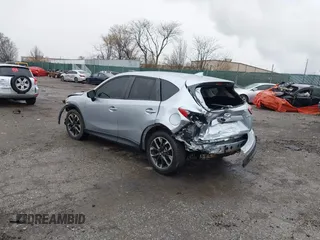 2016 Mazda CX-5 Grand Touring with VIN JM3KE4DY4G0712465, listed as a IAAI auction lot 41859217 with 61,806 mi miles and . Bid and sale history available at carsss.com. Image 3.