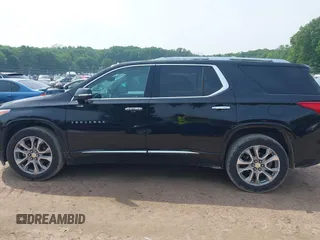 2019 Chevrolet Traverse Premier with VIN 1GNEVKKW1KJ282531, listed as a IAAI auction lot 42408361 with 95,464 mi miles and . Bid and sale history available at DreamBid. Image 14.
