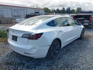 2020 Tesla Model 3 Long Range z VIN 5YJ3E1EB5LF619018, wystawiony jako IAAI lot #42131960 z przebiegiem 29 774 mil mil oraz . Historia ofert i sprzedaży dostępna na DreamBid. Obrazek 6.