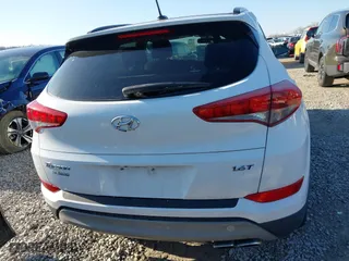 2017 Hyundai Tucson Value with VIN KM8J33A28HU533047, listed as a IAAI auction lot 41853087 with 74,238 mi miles. Bid and sale history available at carsss.com. Image 16.