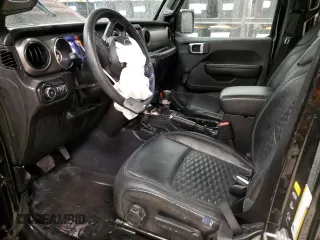 2022 Jeep Wrangler Unlimited Sport with VIN 1C4HJXDG4NW206622, listed as a Copart auction lot 87664525 with 62,240 mi miles and Salvage Title. Bid and sale history available at DreamBid. Image 7.