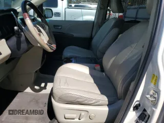2011 Toyota Sienna XLE AAS with VIN 5TDYK3DC1BS013892, listed as a Copart auction lot 50239495 with 162,184 mi miles and Salvage Title. Bid and sale history available at DreamBid. Image 7.