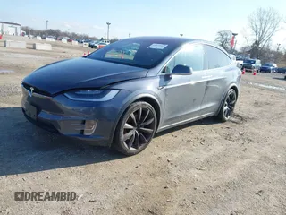 2020 Tesla Model X Long Range with VIN 5YJXCBE2XLF230629, listed as a IAAI auction lot 41925961 with 35,979 mi miles. Bid and sale history available at carsss.com. Image 2.
