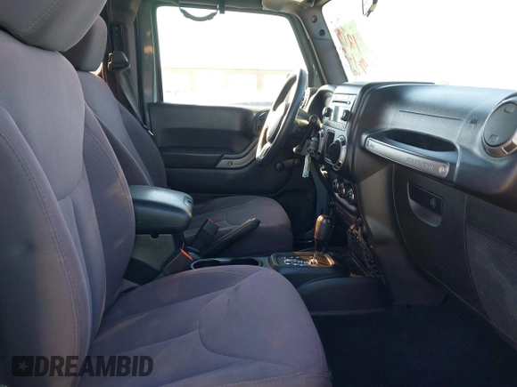 2015 Jeep Wrangler Sport with VIN 1C4AJWAG0FL591213, listed as a IAAI auction lot 41893306 with 107,807 mi miles and . Bid and sale history available at DreamBid. Image 5.