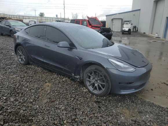 2022 Tesla Model 3 Long Range with VIN 5YJ3E1EB3NF299331, listed as a Copart auction lot 44004355 with 56,662 mi miles and Salvage Title. Bid and sale history available at carsss.com. Image 4.