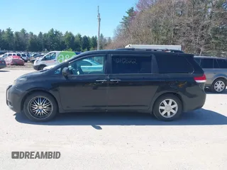 2011 Toyota Sienna XLE with VIN 5TDDK3DC8BS011975, listed as a IAAI auction lot 42112522 with 124,251 mi miles. Bid and sale history available at carsss.com. Image 14.