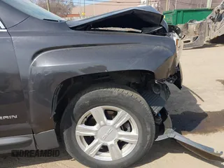 2014 GMC Terrain SLE z VIN 2GKALMEK5E6336243, wystawiony jako IAAI lot #42064378 z przebiegiem 113 379 mil mil oraz . Historia ofert i sprzedaży dostępna na DreamBid. Obrazek 6.