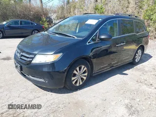 2014 Honda Odyssey EX-L with VIN 5FNRL5H68EB102286, listed as a IAAI auction lot 42148323 with 160,446 mi miles and . Bid and sale history available at carsss.com. Image 2.