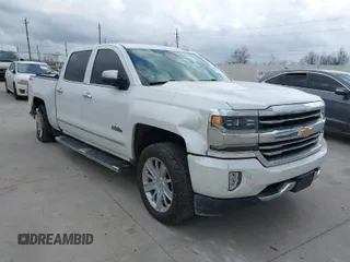 2018 Chevrolet Silverado 1500 High Country with VIN 3GCUKTEC0JG211759, listed as a IAAI auction lot 41687758 with Not Provided miles and . Bid and sale history available at DreamBid. Image 1.