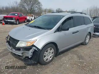 2013 Honda Odyssey LX with VIN 5FNRL5H22DB086503, listed as a IAAI auction lot 42133471 with 223,200 mi miles and . Bid and sale history available at carsss.com. Image 2.