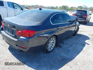 2014 BMW 5 Series 535i with VIN WBA5B1C54ED477525, listed as a IAAI auction lot 41692887 with 122,288 mi miles. Bid and sale history available at carsss.com. Image 4.