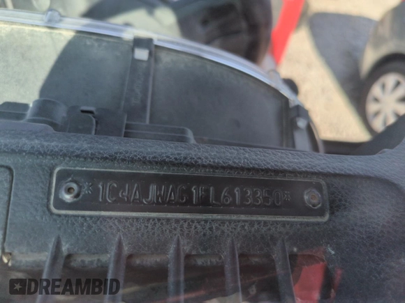 2015 Jeep Wrangler Freedom Edition with VIN 1C4AJWAG1FL613350, listed as a Copart auction lot 61978965 with Not provided miles and Salvage title. Bid and sale history available at DreamBid. Image 13.