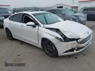 2018 Ford Fusion SE z VIN 3FA6P0HD9JR174492, wystawiony jako IAAI lot #42169560 z przebiegiem 89 361 mil mil oraz . Historia ofert i sprzedaży dostępna na DreamBid. Obrazek 1.