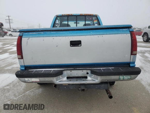 1992 GMC Sierra 2500 z VIN 2GTFK29K3N1539843, wystawiony jako Copart lot #45037335 z przebiegiem 146 355 mil mil oraz Szkody całkowita. Historia ofert i sprzedaży dostępna na DreamBid. Obrazek 6.